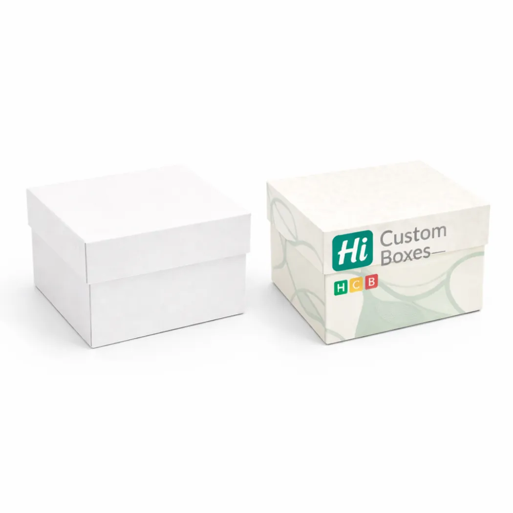 Two square two-piece rigid boxes with lids- one is plain white and one is branded- class=
